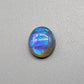 1.75cts Dark Opal with vivid light blue broadflah pattern, with excellent dispersal