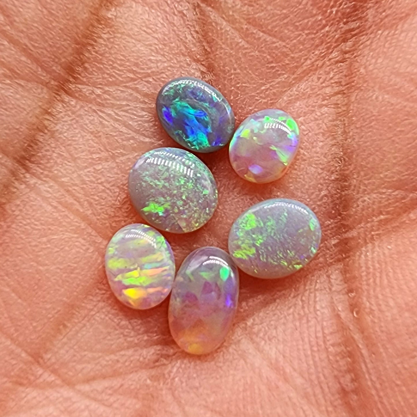 Assorted Crystal, Dark opal and Black Opals with mixed patterns and colors