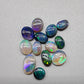 Assorted black opals, dark opals and crystal opals