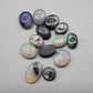 Assorted black opals, dark opals and crystal opals