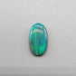 3.0ct teal colored black opal with a striated moss pattern