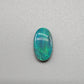 3.0ct teal colored black opal with a striated moss pattern