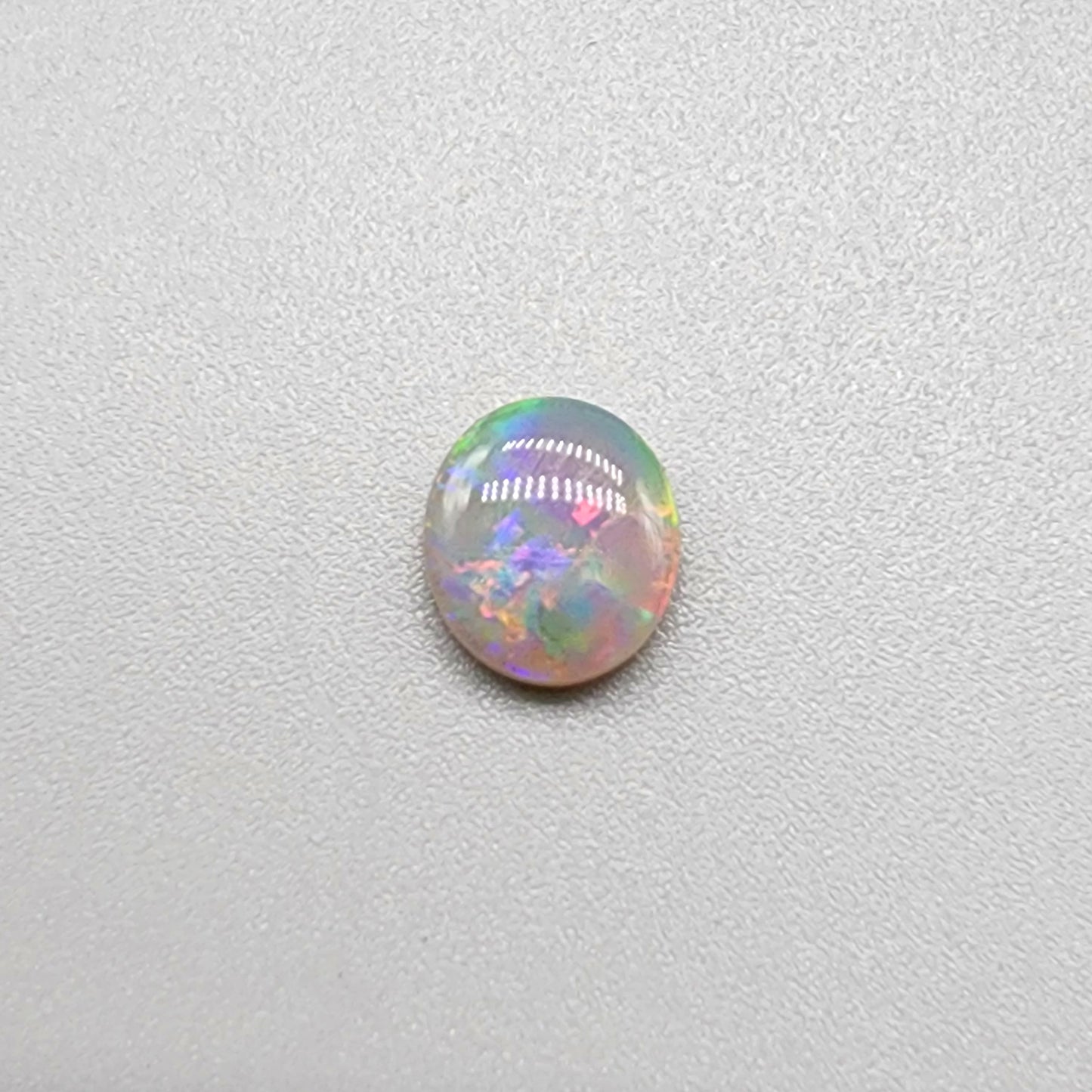 .90cts Dark Opal with multicolor sunset color palette