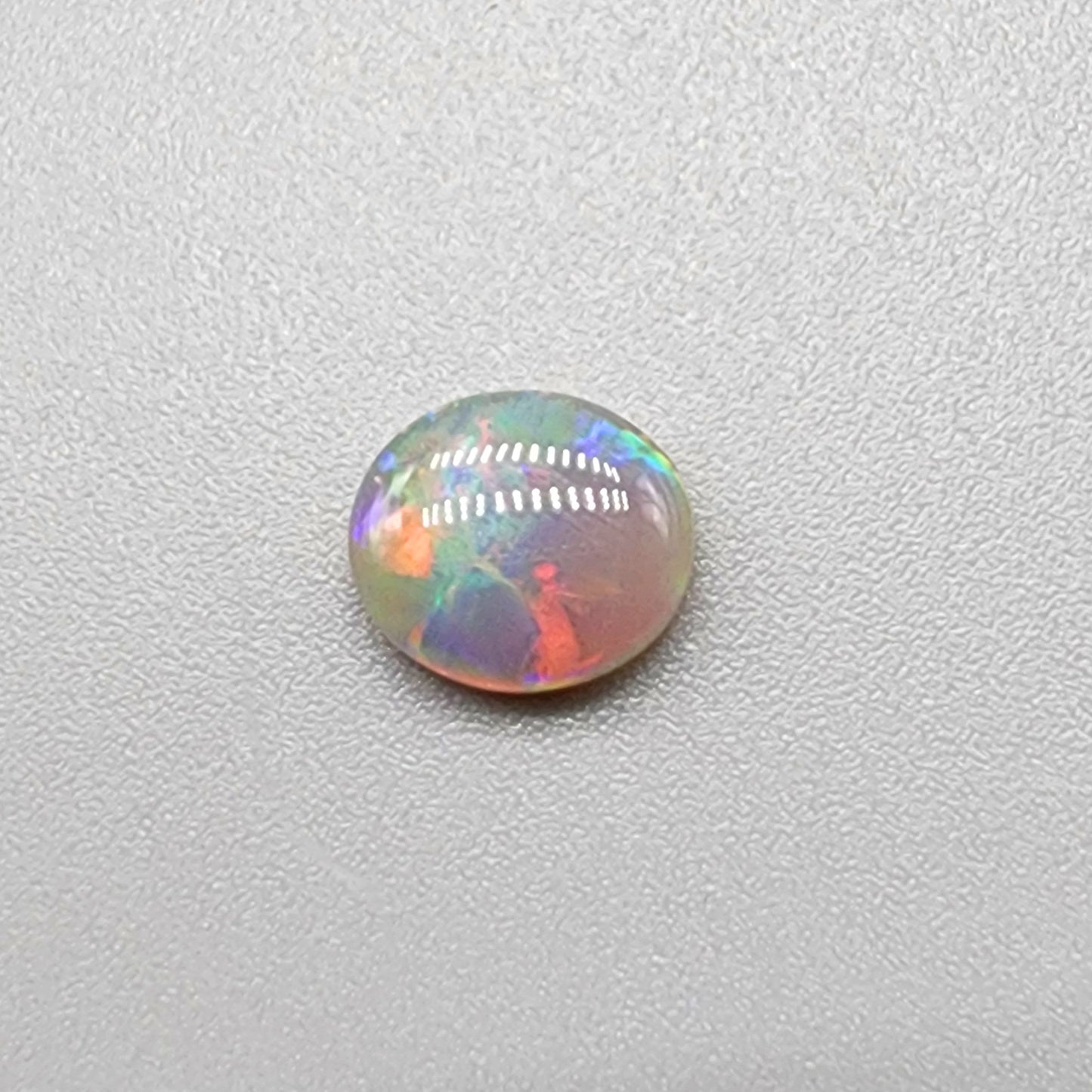 .90cts Dark Opal with multicolor sunset color palette