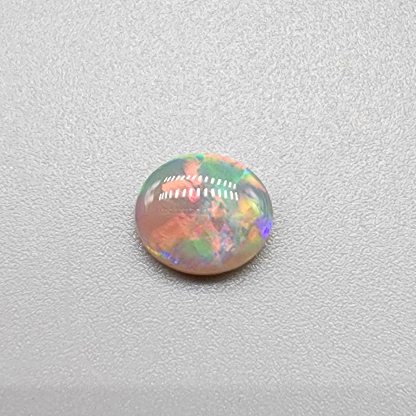 .90cts Dark Opal with multicolor sunset color palette