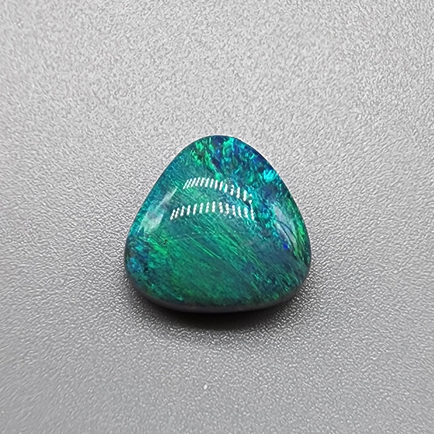 3.6cts teal pallet Black opal with a striated moss pattern