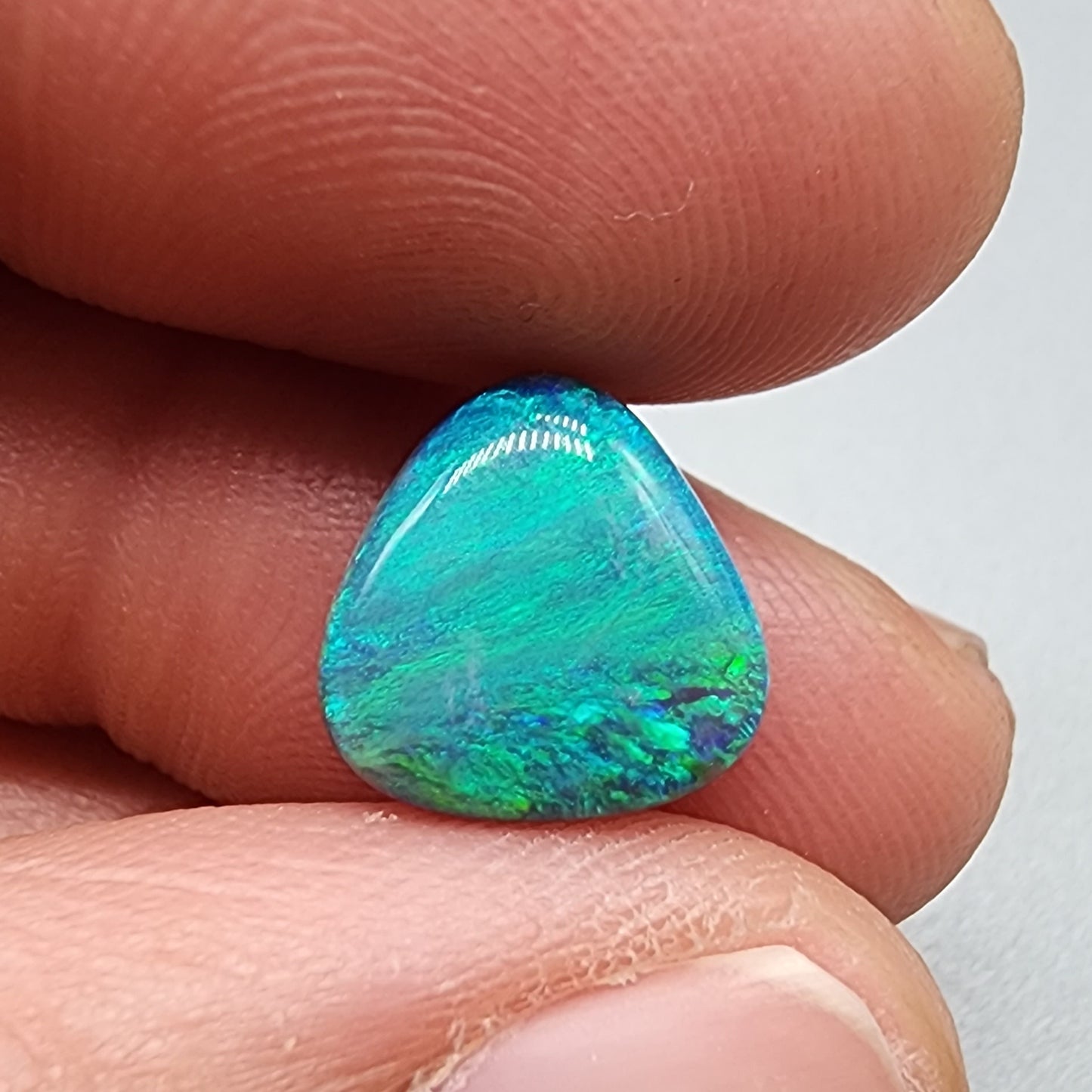 3.6cts teal pallet Black opal with a striated moss pattern