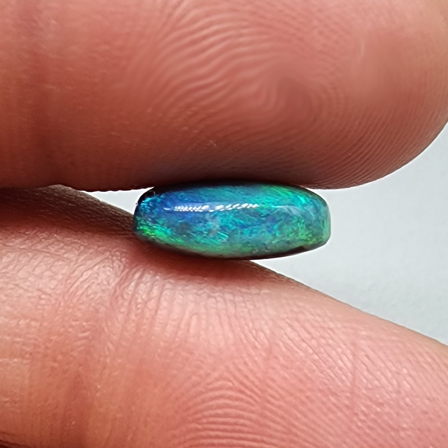 3.6cts teal pallet Black opal with a striated moss pattern