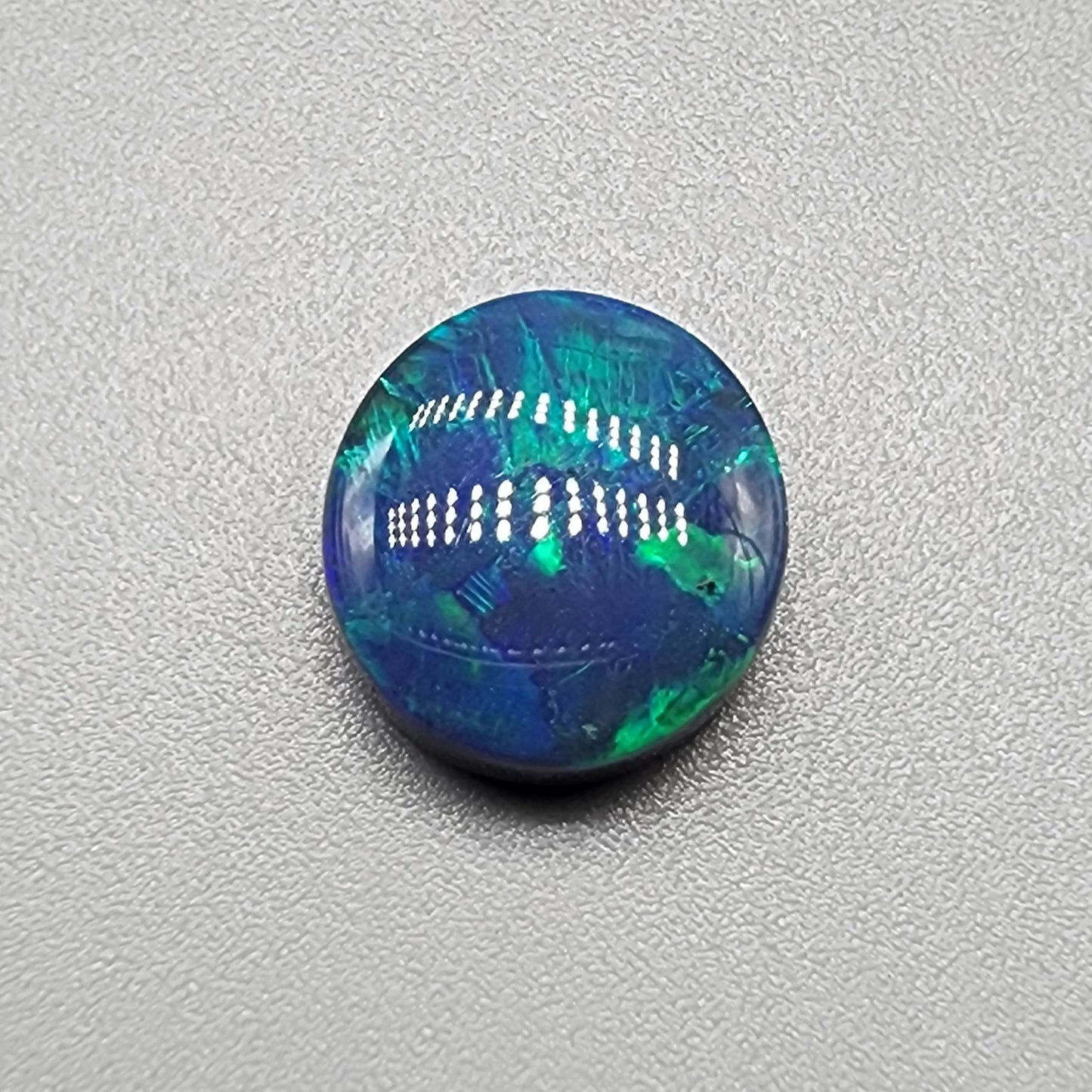 2.6ct Black Opal with blue green mixed patterns