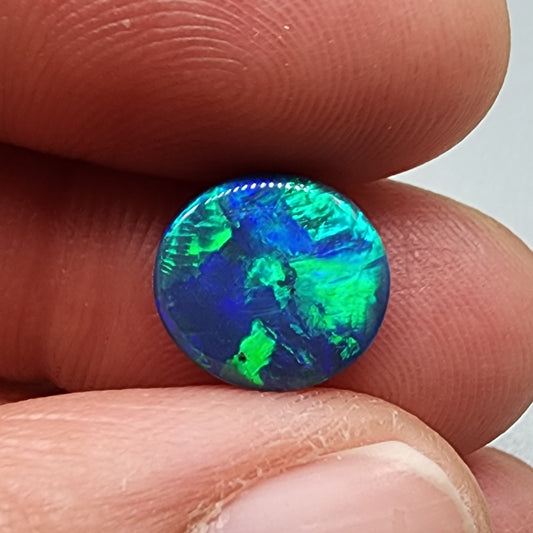 2.6ct Black Opal with blue green mixed patterns