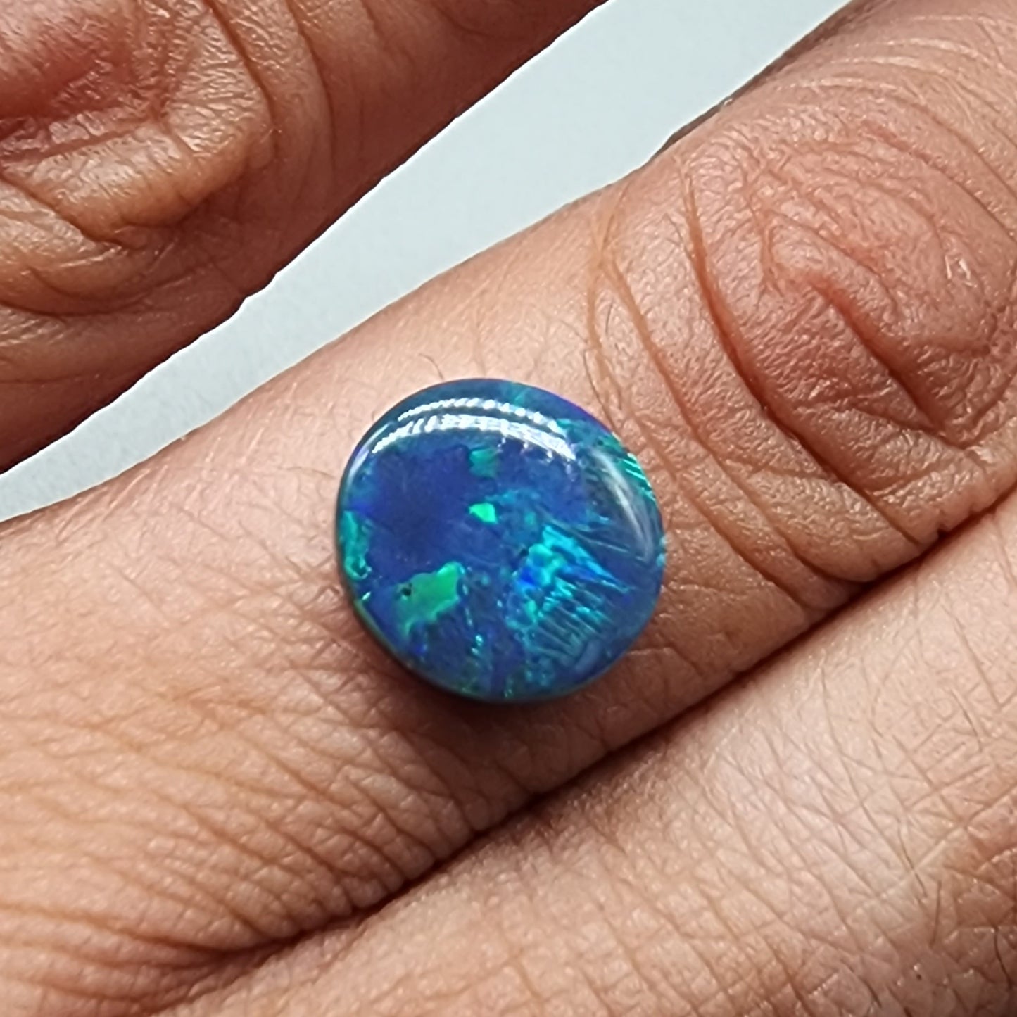 2.6ct Black Opal with blue green mixed patterns