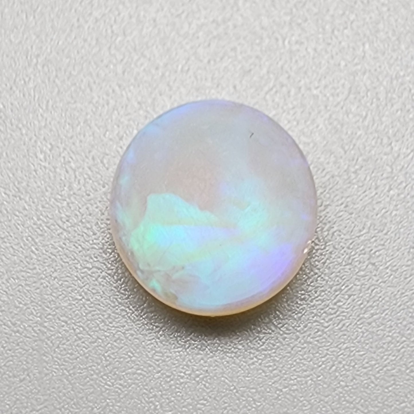 2.8ct Crystal Opal with minty green patterning and hints of blue