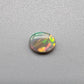 0.65ct Dark Opal with a multicolor pallet