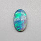 1.35ct Half black opal, half crystal opal with vivid green flash.