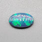 1.35ct Half black opal, half crystal opal with vivid green flash.