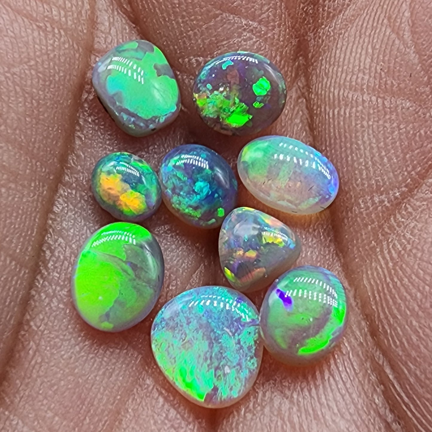 Assorted selection of Dark opals with vivid color play