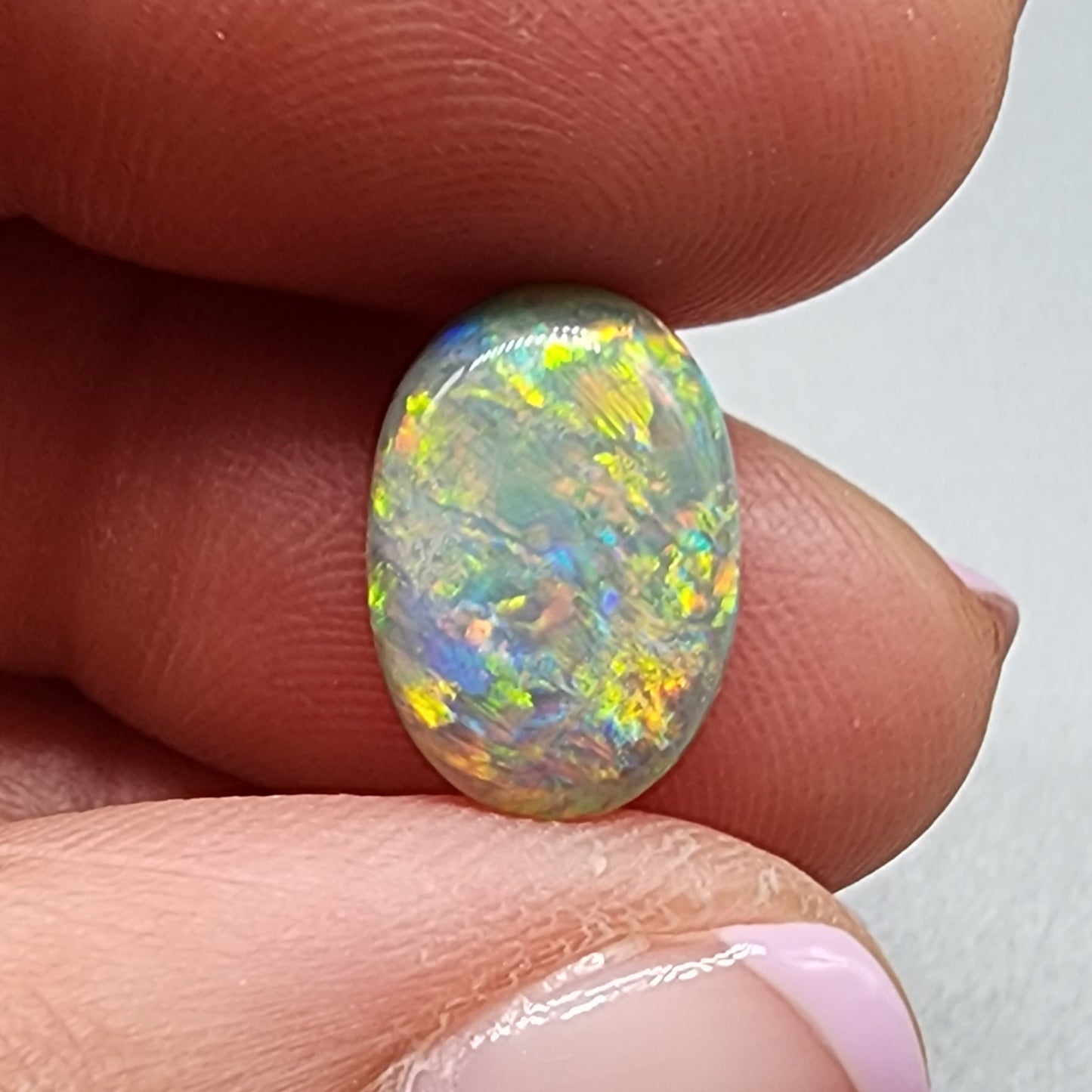 4cts Black Opal with a warm color pallet an mixed patterns