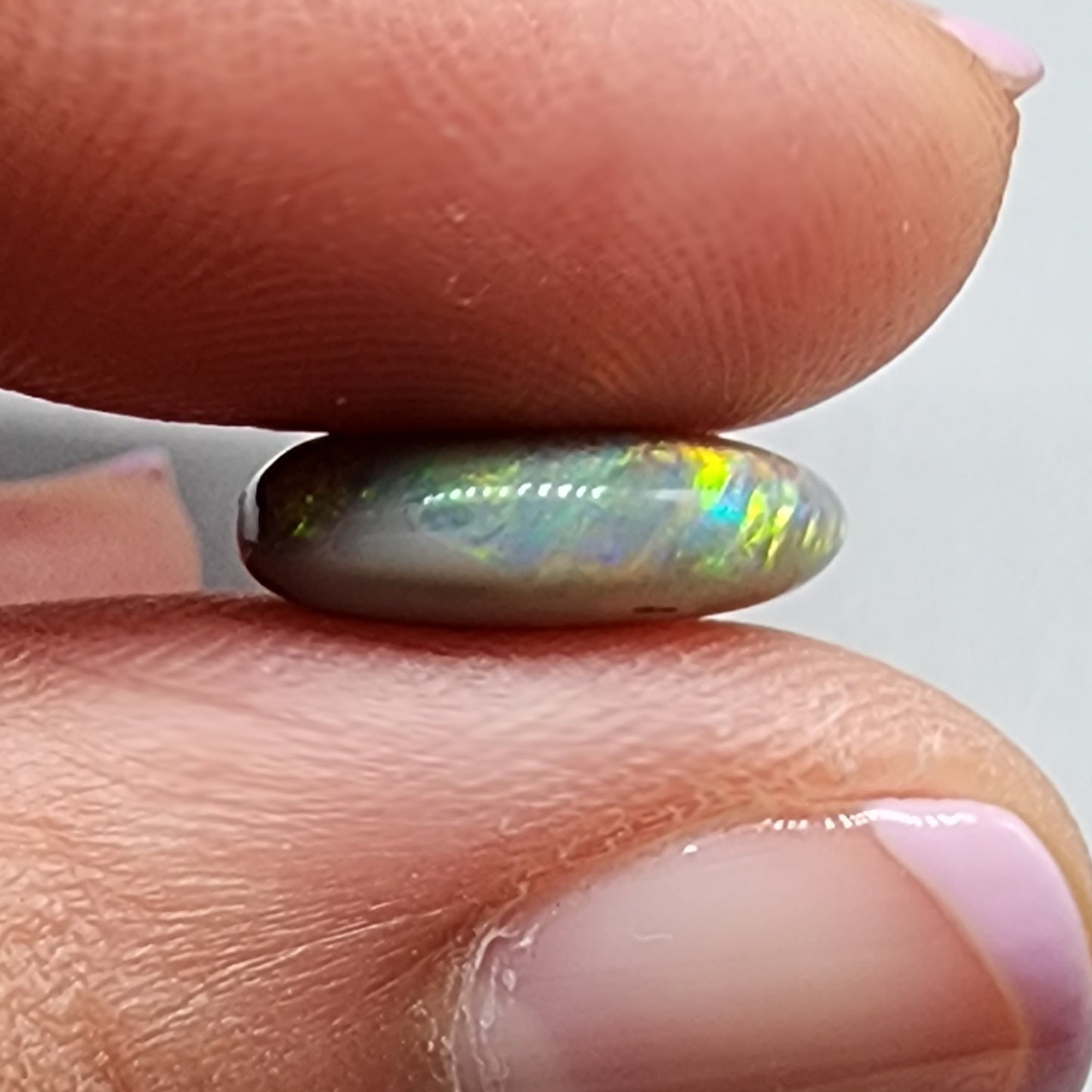 4cts Black Opal with a warm color pallet an mixed patterns