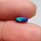 1.15 cts black Opal with vivid teal and broad flash pattern