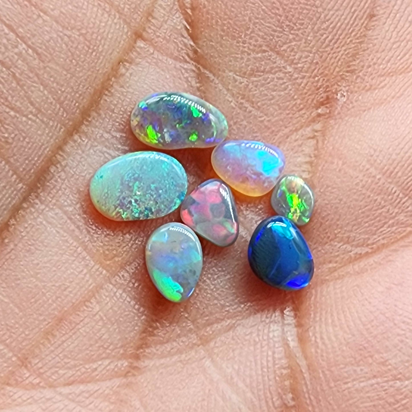 Assorted  Crystal, black and semi black opals