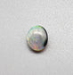 0.55ct Dark Opal with a multicolor striated pattern