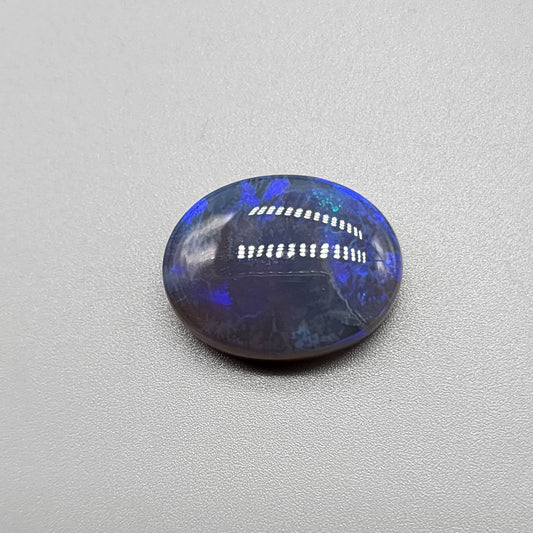 Large 11.40cts black Crystal opal  with a dark blue color palette