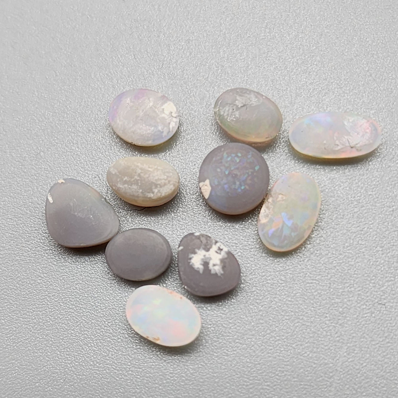 Assorted Crystal, Black and Dark opals with bright, sunset color palettes