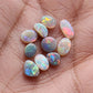 Assorted Crystal, Black and Dark opals with bright, sunset color palettes