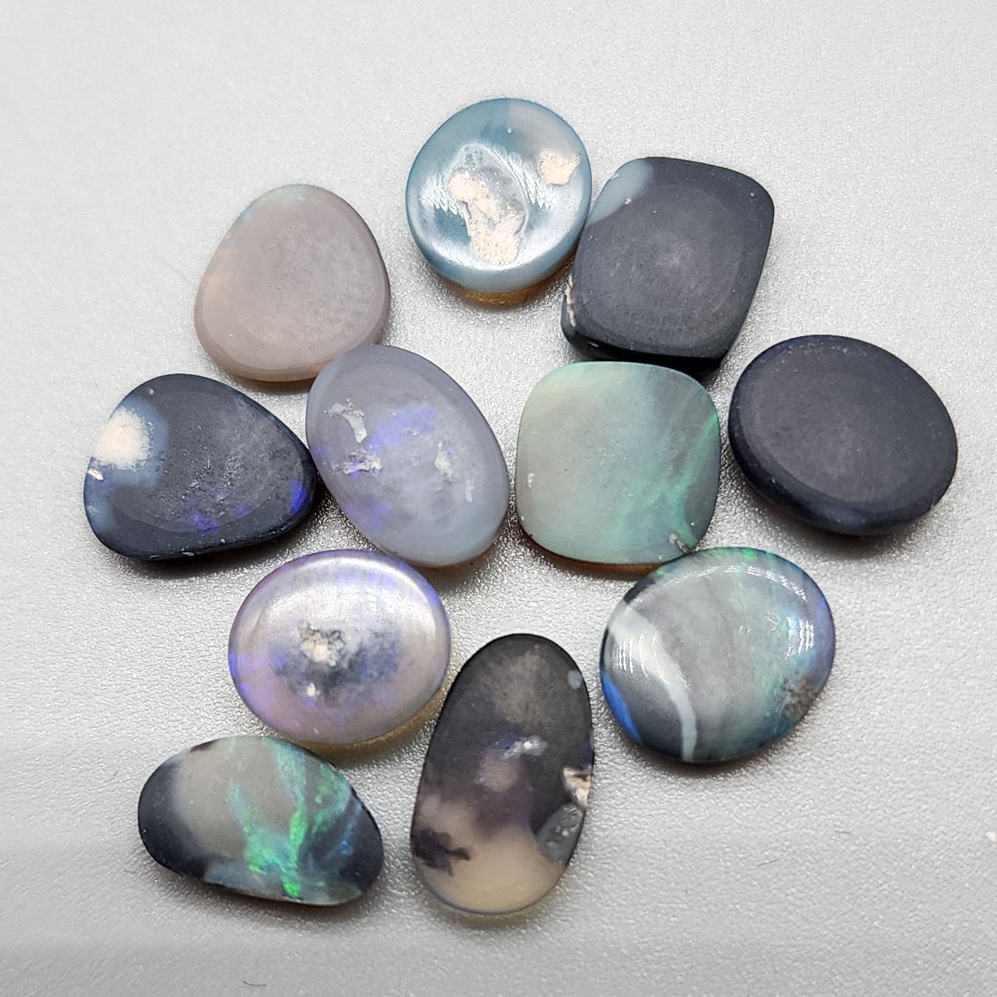 Assorted Crystal, Dark opal and Black Opals with textured color pallets