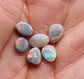 Assortment of dark opals with lovely pastel color palette