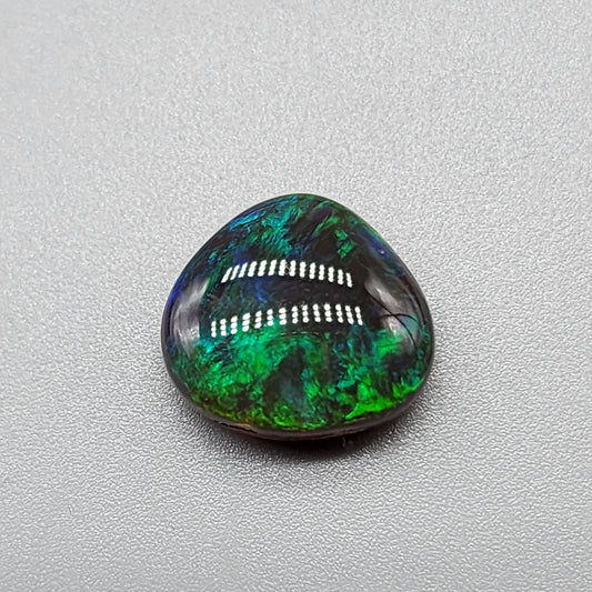 5.4cts Black Opal with rich forest green and hints of teal