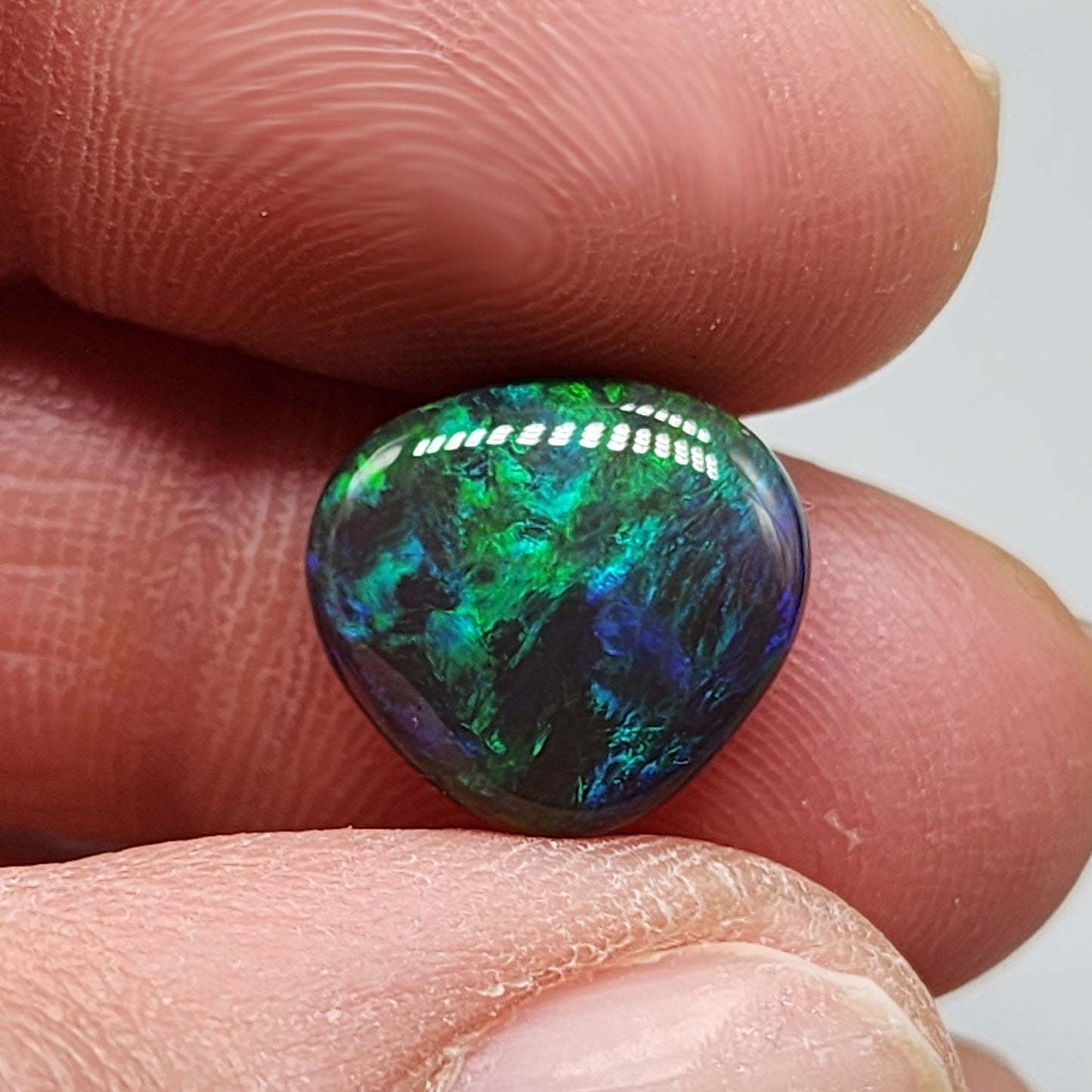 5.4cts Black Opal with rich forest green and hints of teal