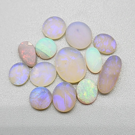 Assorted Matte opals with a sea glass like look and soft glow