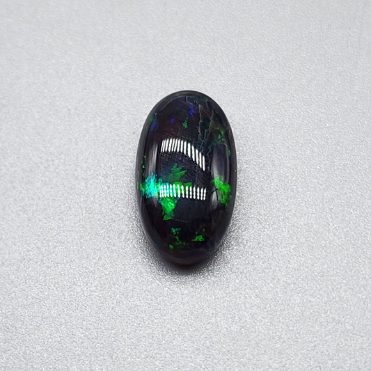 3.5cts black Opal with rare forest green pattern