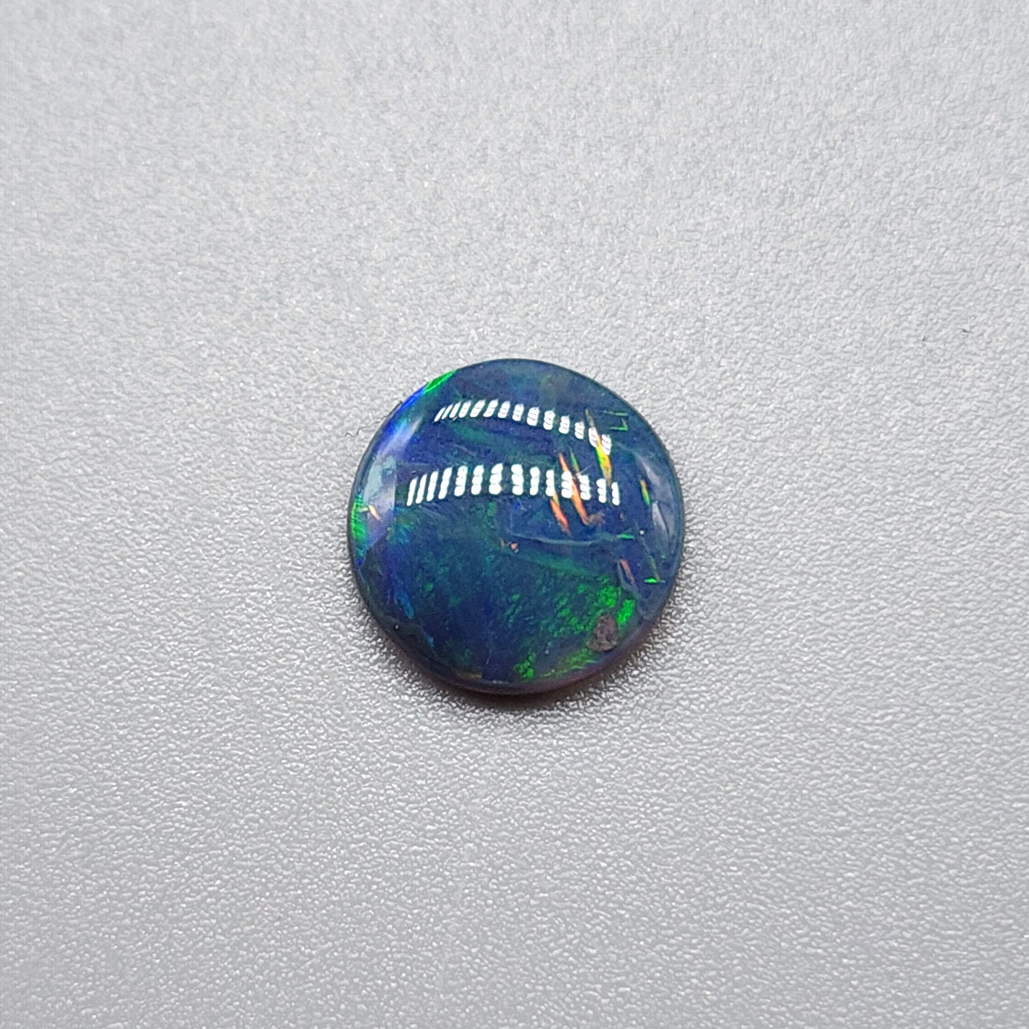 1.1cts black Opal with  Rare straw patter