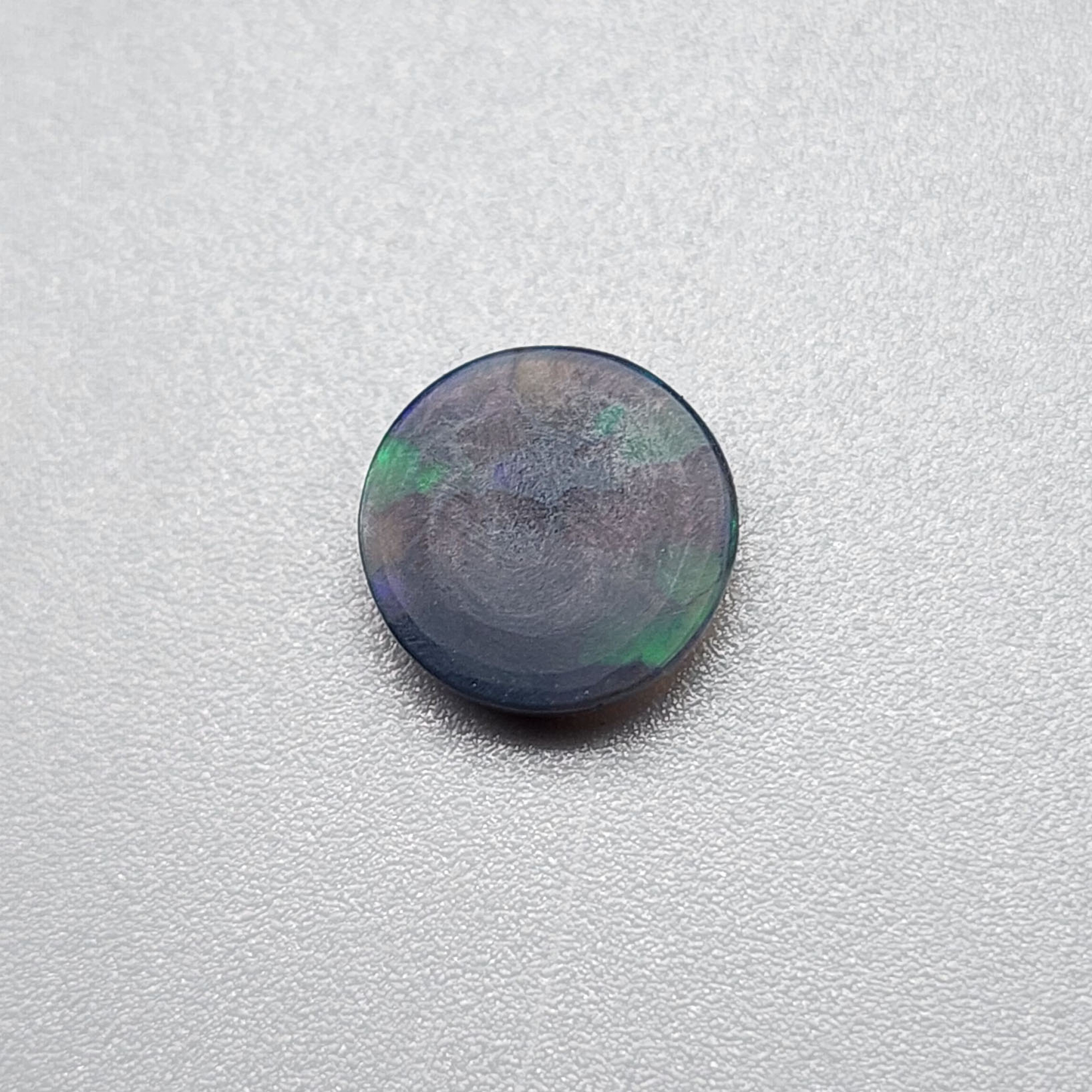 1.1cts black Opal with  Rare straw patter