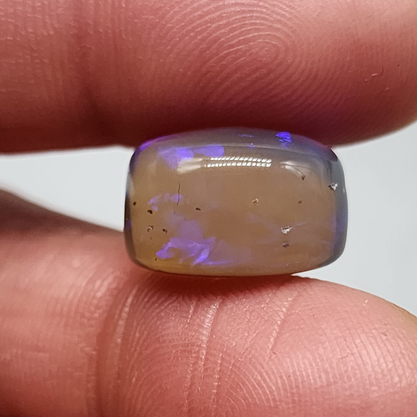 Large 15cts Crystal Opal with violet color play