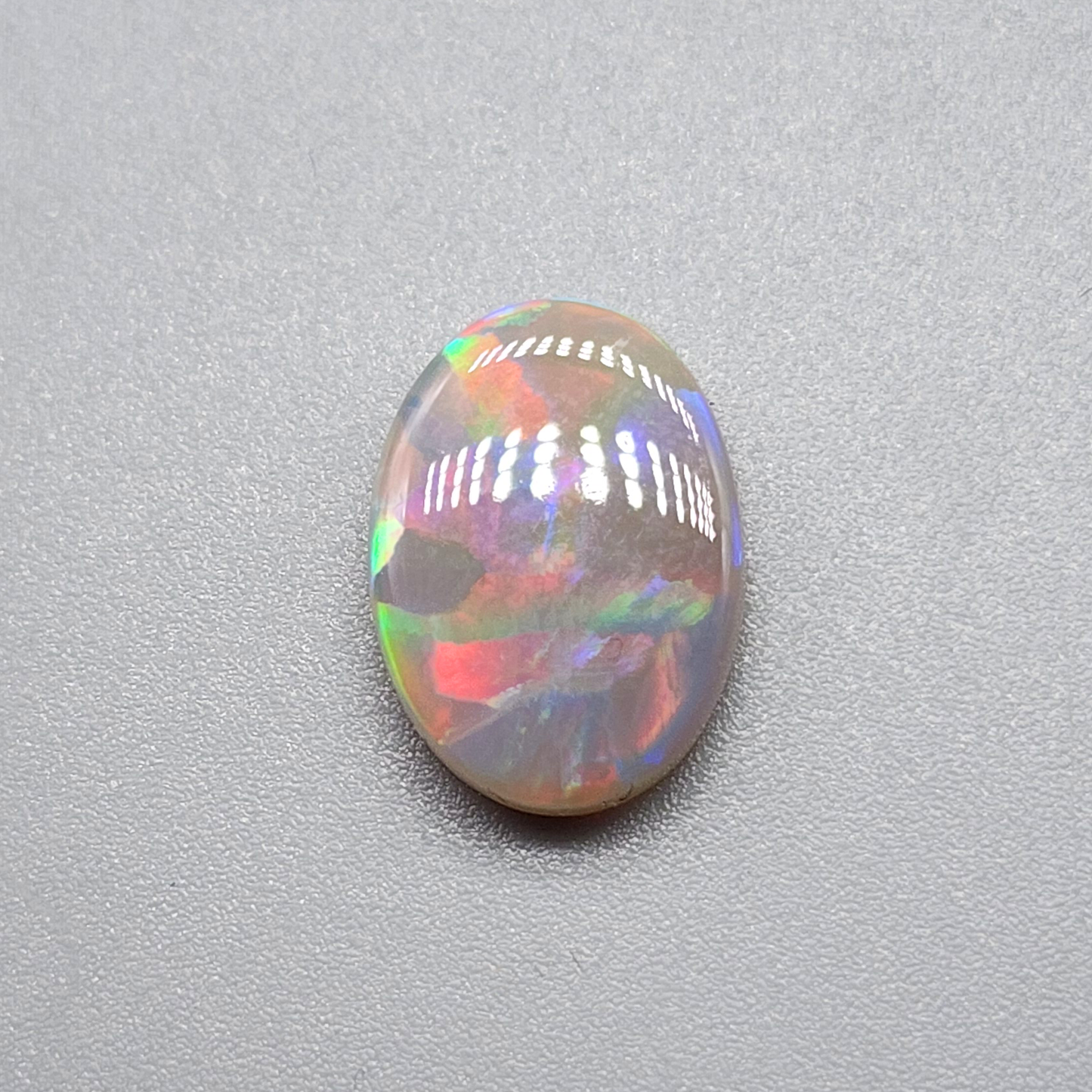 3.2cts Dark Opal with brilliant flagstone pattern and a sunset color palette