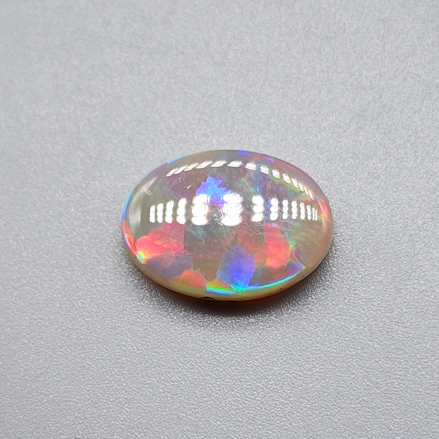 3.2cts Dark Opal with brilliant flagstone pattern and a sunset color palette