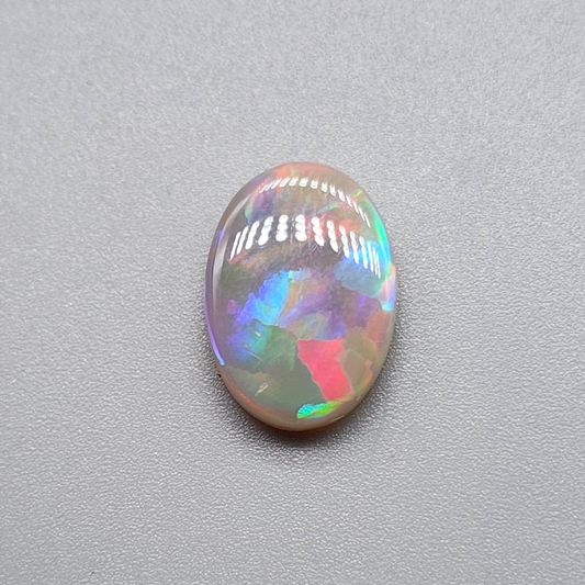 3.2cts Dark Opal with brilliant flagstone pattern and a sunset color palette