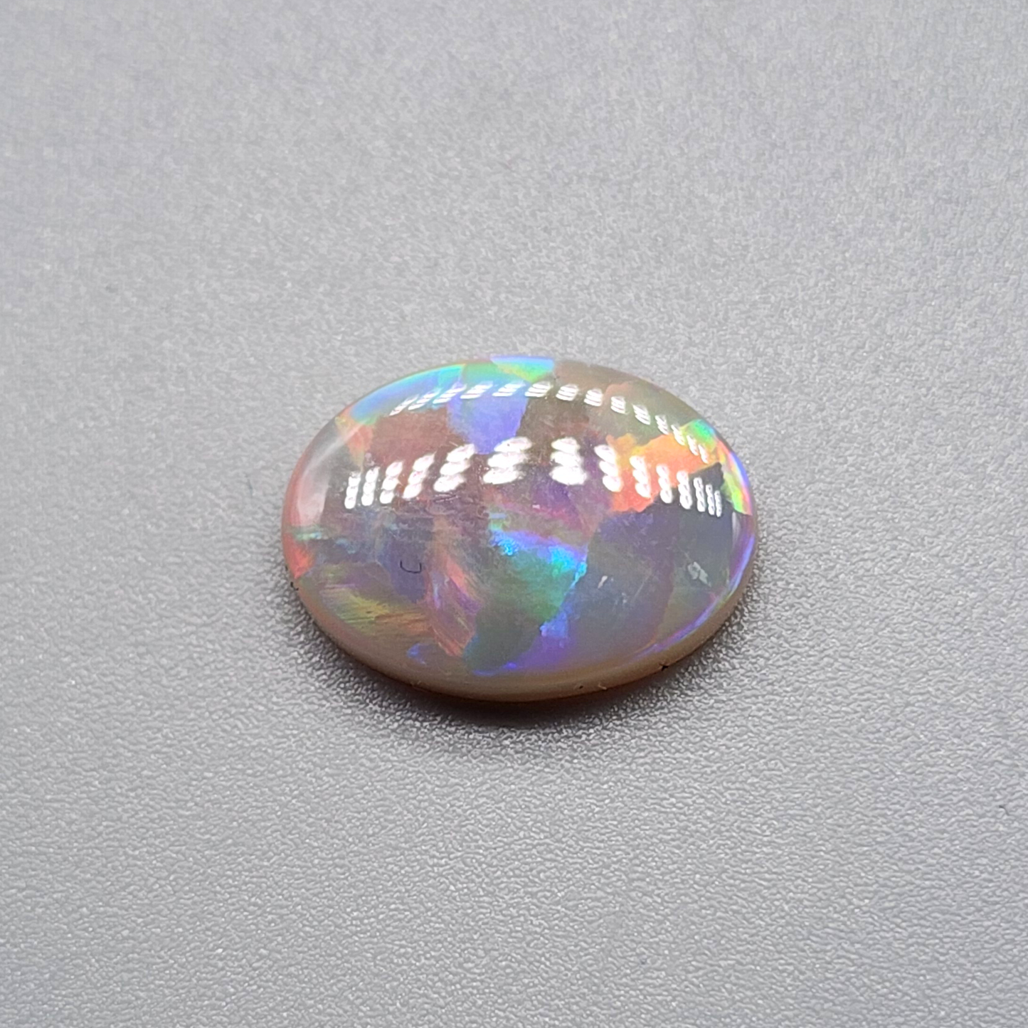 3.2cts Dark Opal with brilliant flagstone pattern and a sunset color palette