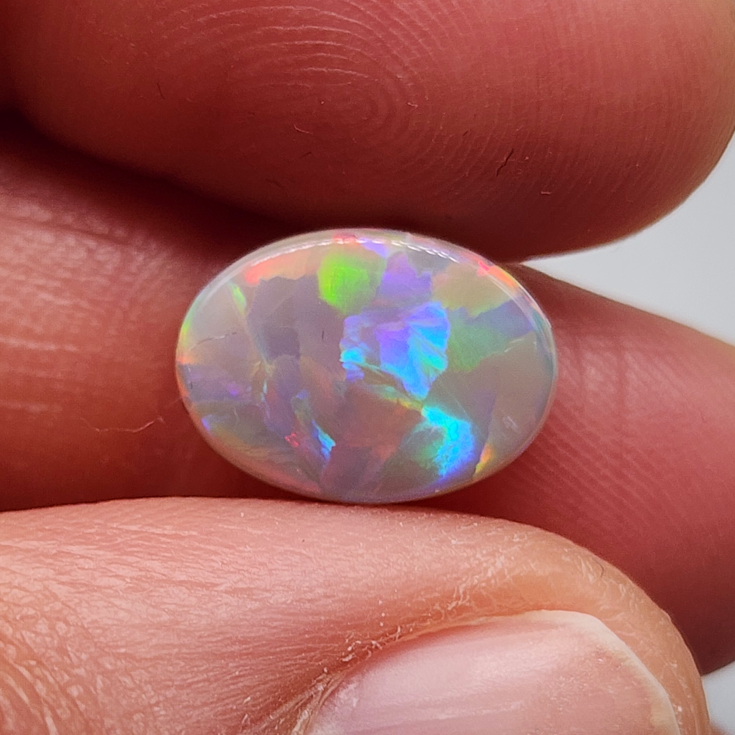 3.2cts Dark Opal with brilliant flagstone pattern and a sunset color palette