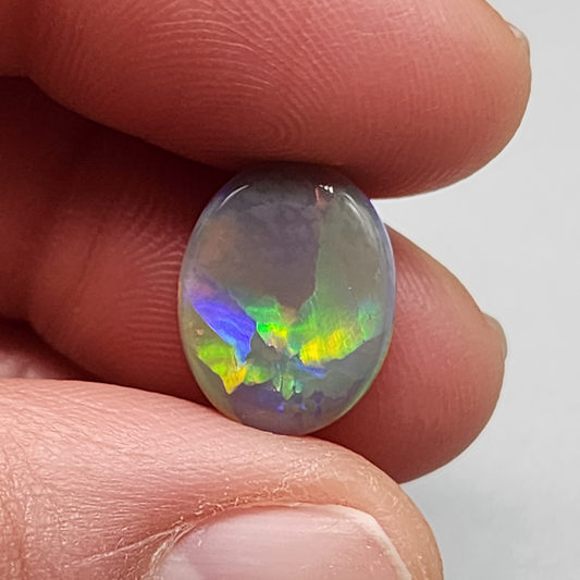 4.2cts Dark Opal with directional but vivid rolling color play