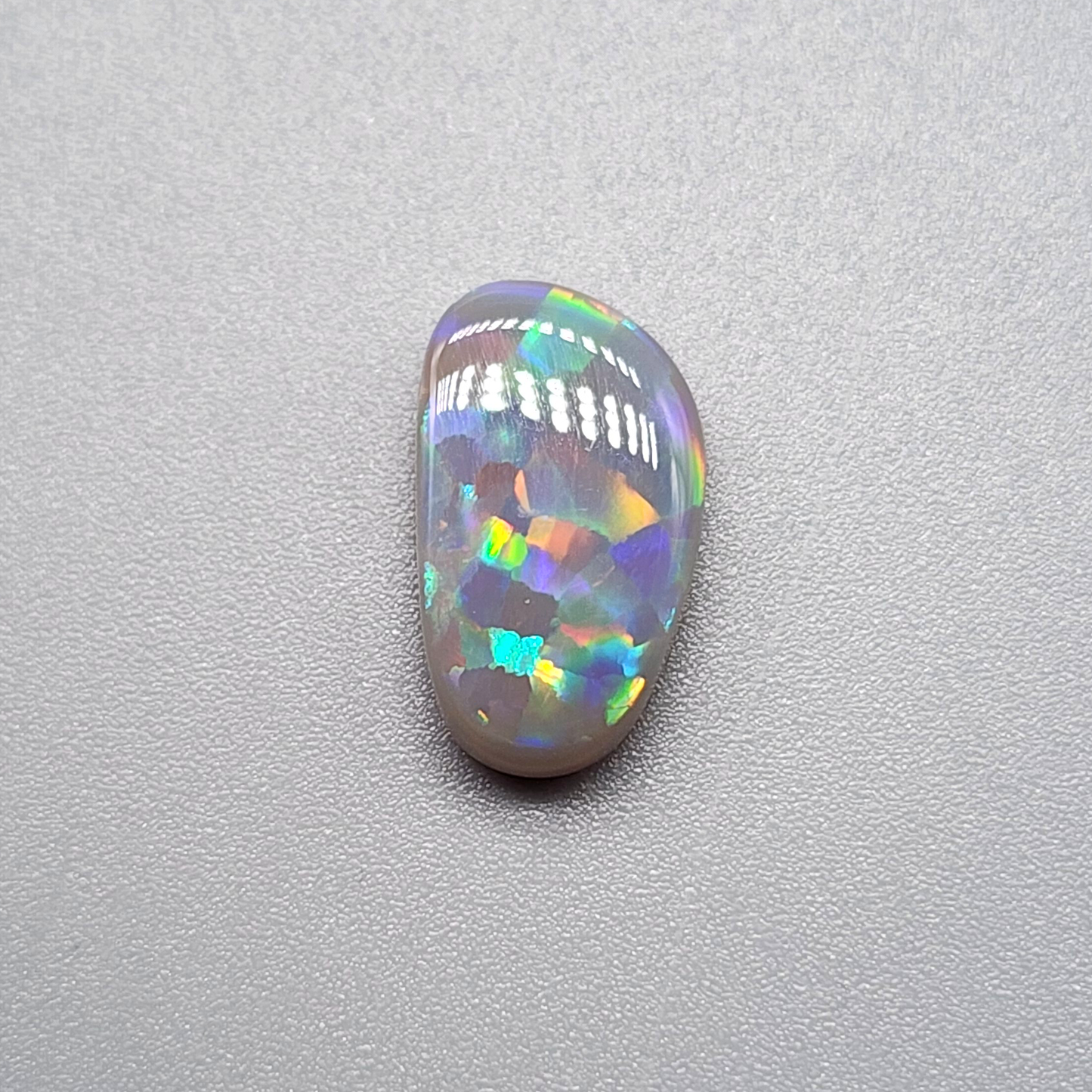 3cts Dark Opal with flagstone pattern and pastel color palette