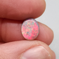 1.5cts Dark Opal with vivid pinkls and flecks of green