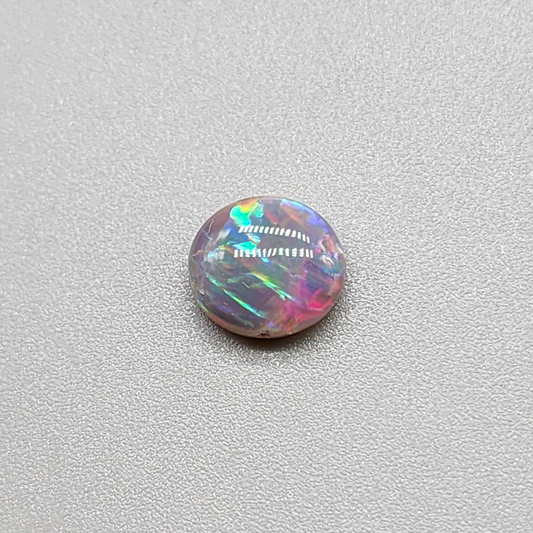 1.25cts  Dark Opal with vivid multi color pastel color palette