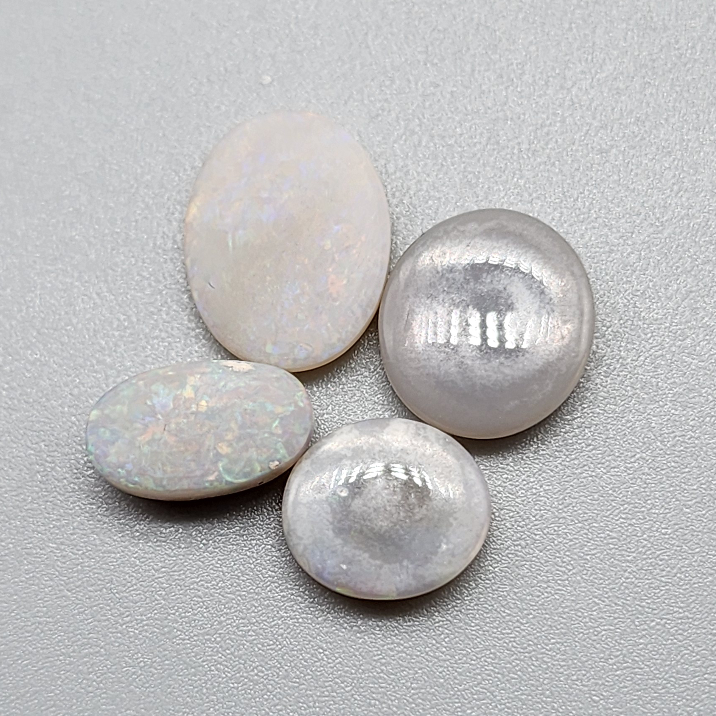 Assorted Dark opals with pastel color palettes