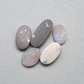 Assorted Black and Dark opals with pastel color palettes