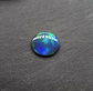 Black opal with bright green-blue  broadflash pattern