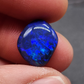 Gem black opal with dence patterning. this stone exhibits a lovely blue ombre effect with movement